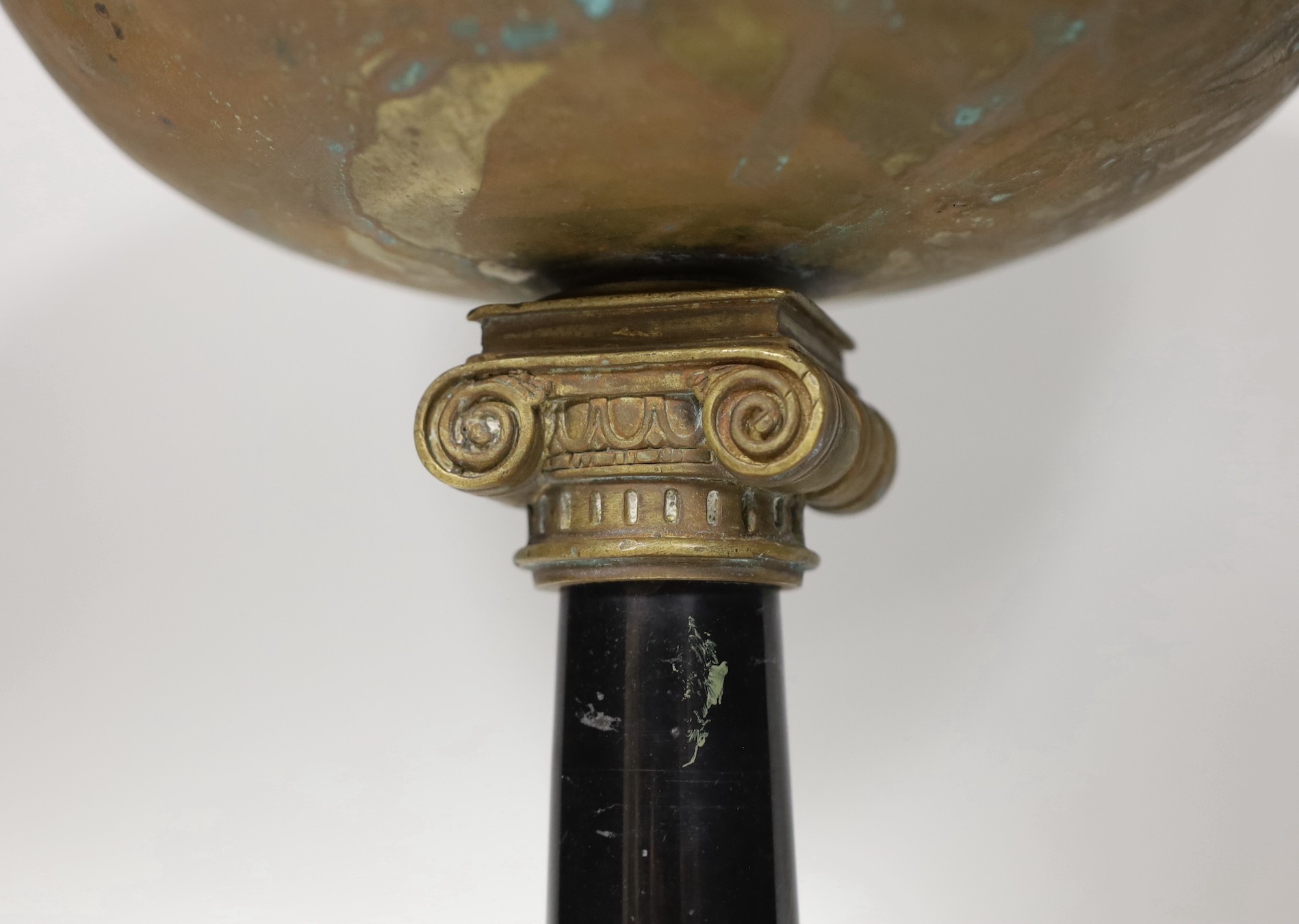 A brass bowl with Ionic column stand, 30cm high